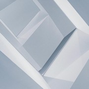 Abstract geometric design featuring minimalist shades of blue and grey with sharp angles.
